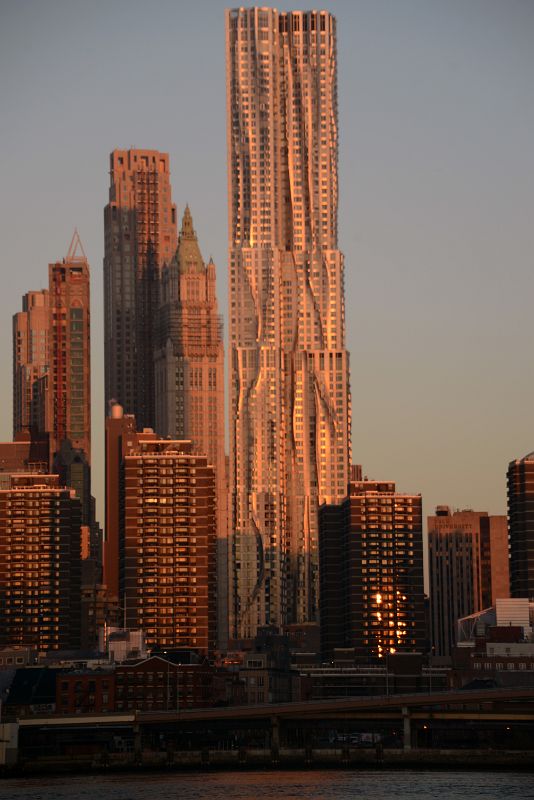 06-2 New York Financial District 30 Park Place, Woolworth Building, New York by Gehry At Sunrise From Brooklyn Heights